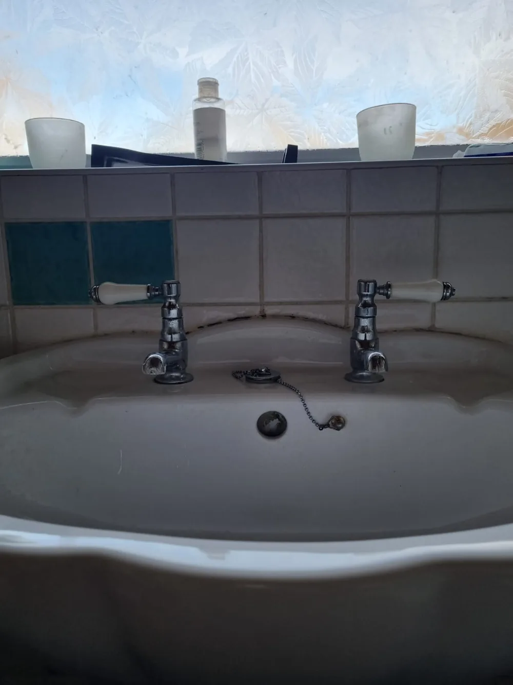 Worn leaking basin taps before replacement