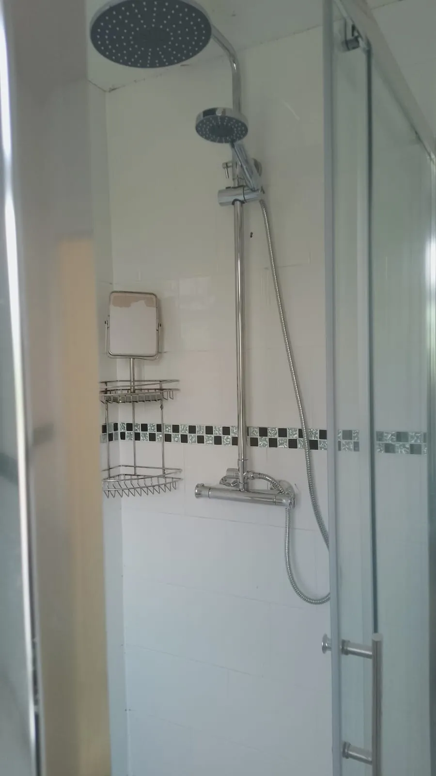 New chrome thermostatic rainfall shower fitted after replacement in an Earlsdon Coventry bathroom